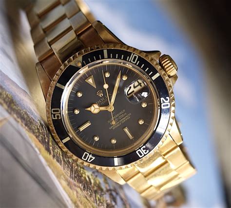 rolex submariner 18kt yellow gold